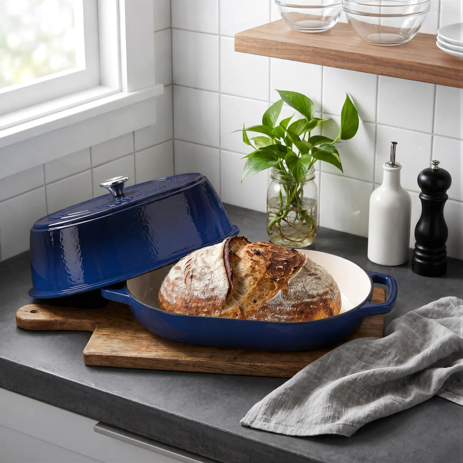 An oval domed bread oven, 6 qt, blue